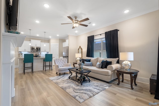413 Lando Cain Rd, Hartselle, AL 35640 - living room featuring a ceiling fan, light wood-style flooring, ornamental molding, recessed lighting, and baseboards