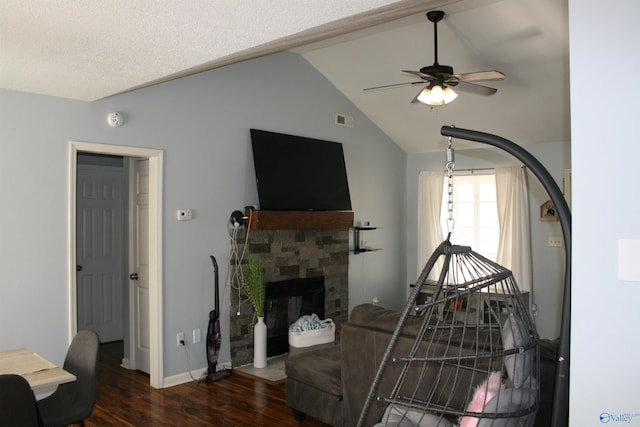 living room featuring ceiling fan, lofted ceiling, and dark hardwood / wood-style flooring