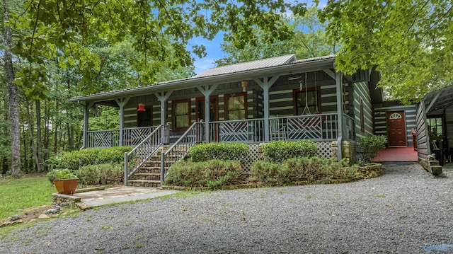 view of front of home featuring covered porch