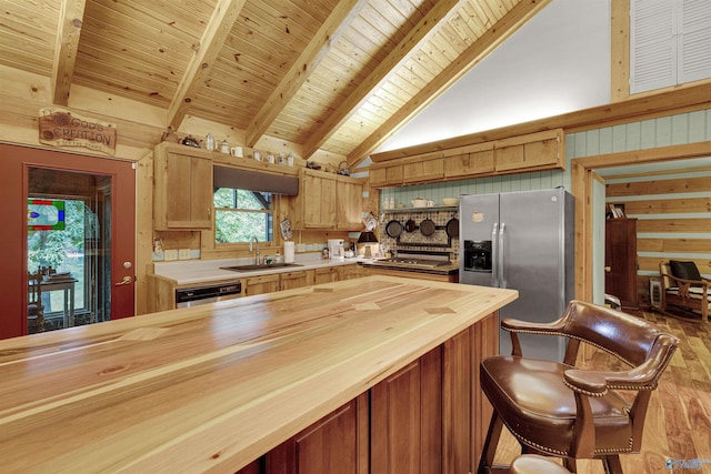 kitchen featuring sink, beamed ceiling, light hardwood / wood-style floors, dishwasher, and wood ceiling