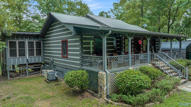 exterior space featuring central AC unit