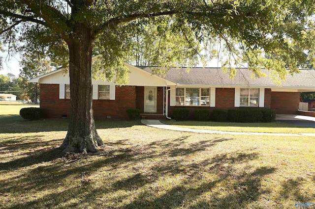 ranch-style house with brick siding, crawl space, and a front yard