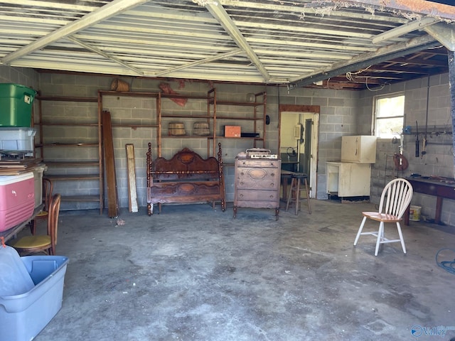 garage featuring concrete block wall