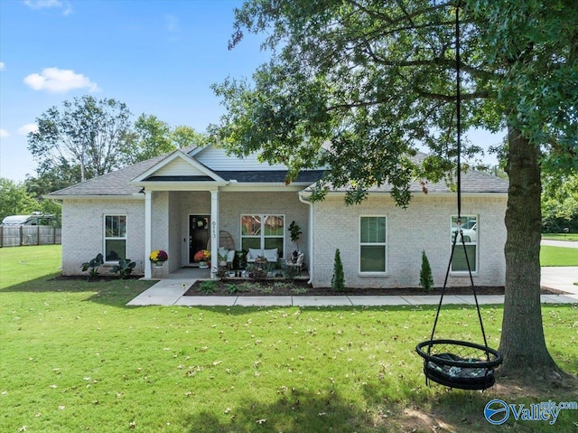 view of front of property with a front lawn