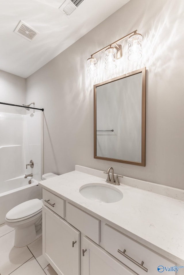 full bathroom with vanity, tile patterned floors, bathtub / shower combination, and toilet