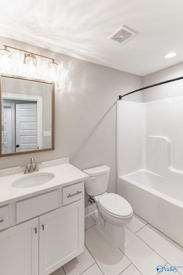 full bathroom with tile patterned floors, vanity, toilet, and shower / tub combination