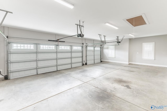 garage featuring a garage door opener