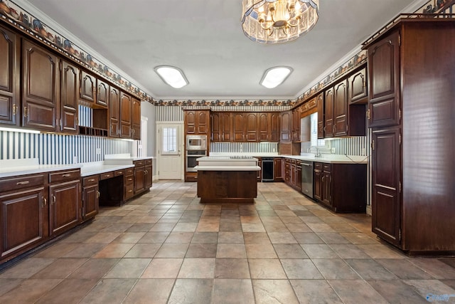 kitchen with light tile patterned flooring, dark brown cabinets, ornamental molding, a center island, and appliances with stainless steel finishes