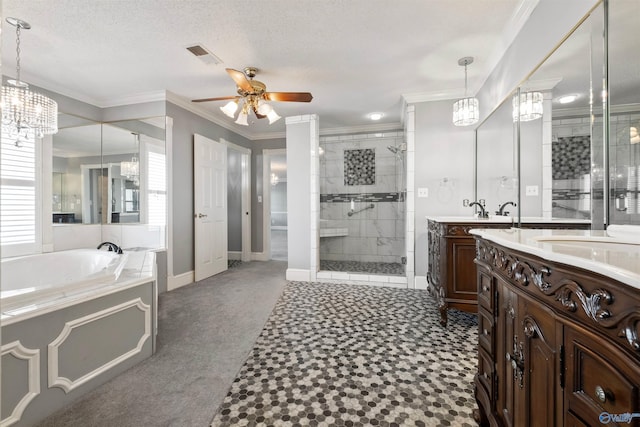 bathroom featuring a textured ceiling, ceiling fan with notable chandelier, vanity, separate shower and tub, and ornamental molding