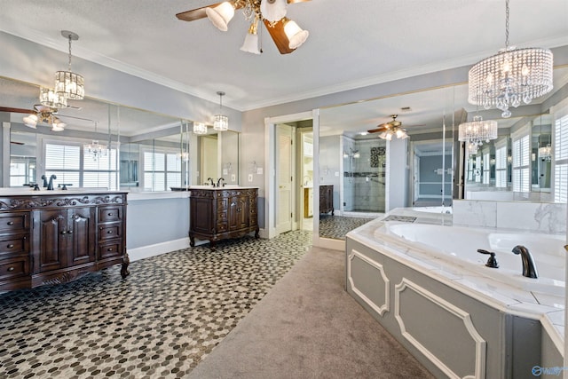 bathroom featuring vanity, crown molding, shower with separate bathtub, and ceiling fan with notable chandelier