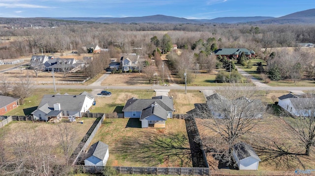 drone / aerial view featuring a mountain view