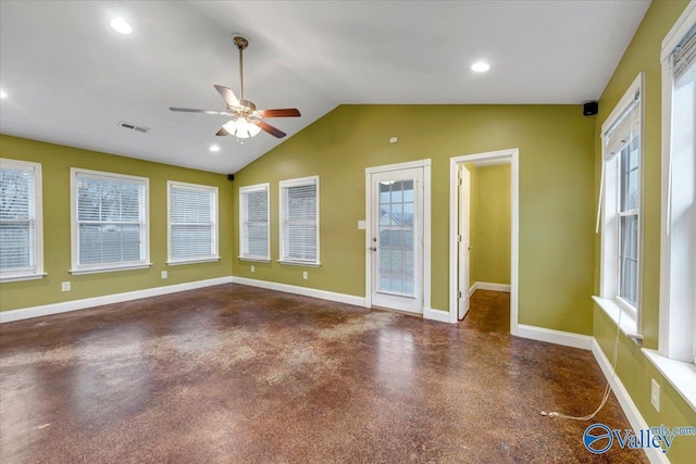 interior space featuring ceiling fan and vaulted ceiling