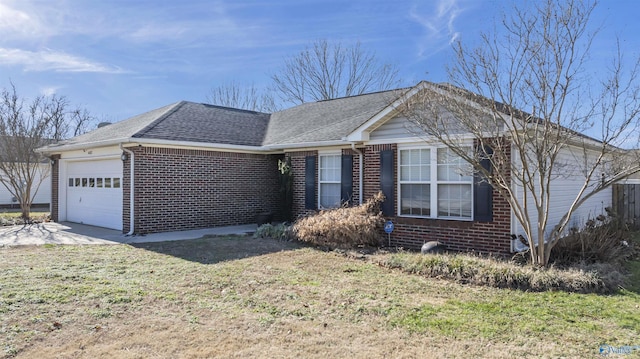 ranch-style house with a garage and a front yard