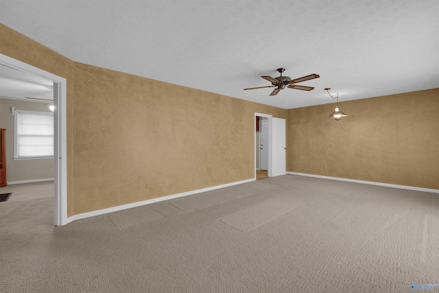 unfurnished room featuring ceiling fan