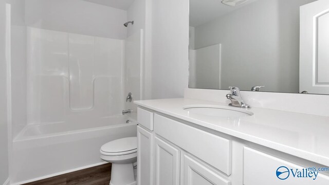 409 Jackson Point Cir, Huntsville, AL 35811 - full bath featuring vanity, toilet, wood finished floors, and shower / washtub combination