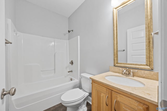 full bathroom featuring bathtub / shower combination, vanity, and toilet