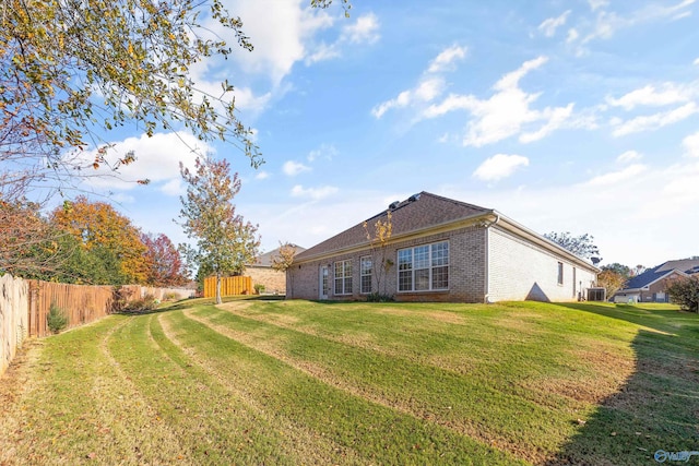 view of yard featuring central AC