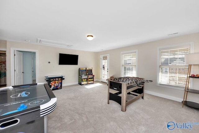 game room with light colored carpet