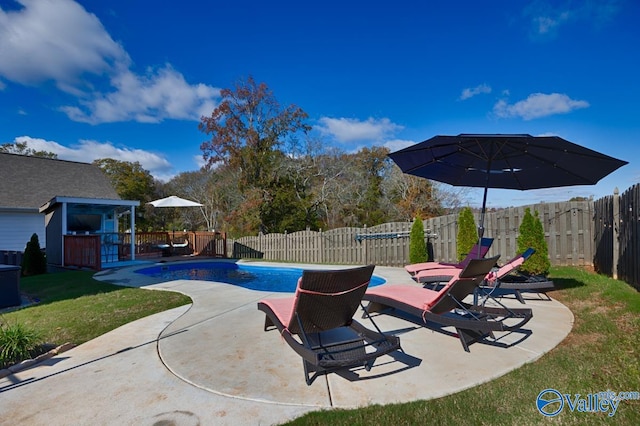 view of patio / terrace featuring a fenced in pool