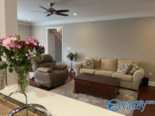 living room with ceiling fan