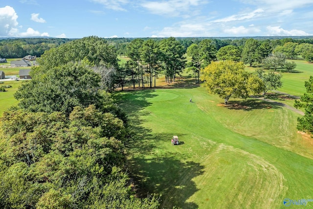 birds eye view of property with view of golf course