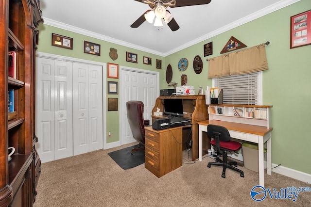 carpeted home office with ornamental molding and ceiling fan