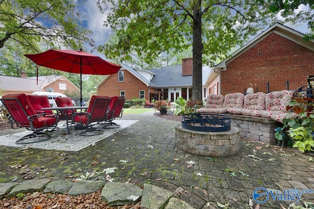 view of patio / terrace featuring a fire pit