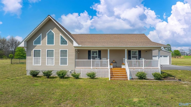 view of front of house featuring aphalt driveway, covered porch, a front lawn, and roof with shingles