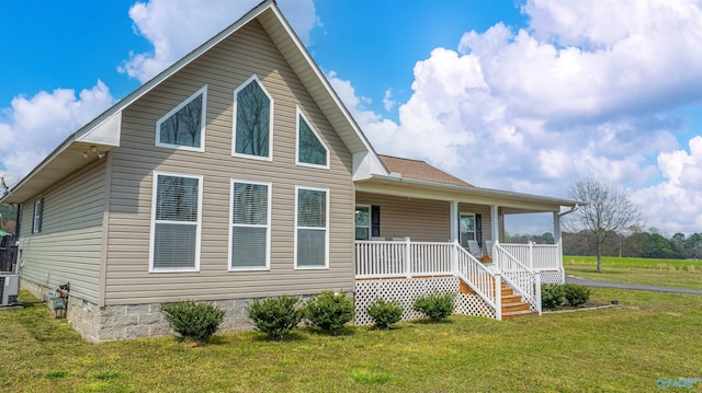 view of front of house featuring crawl space, a front lawn, and a porch