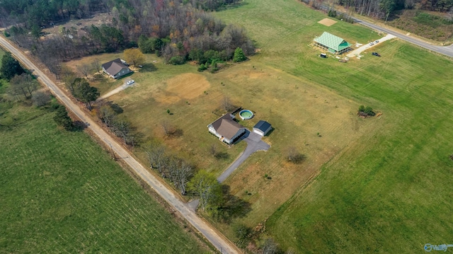 birds eye view of property featuring a rural view