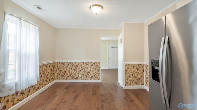 701 10th St NW, Huntsville, AL 35805 - kitchen with baseboards, stainless steel refrigerator with ice dispenser, wallpapered walls, and wood finished floors
