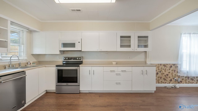 701 10th St NW, Huntsville, AL 35805 - kitchen with stainless steel appliances, visible vents, plenty of natural light, and a sink