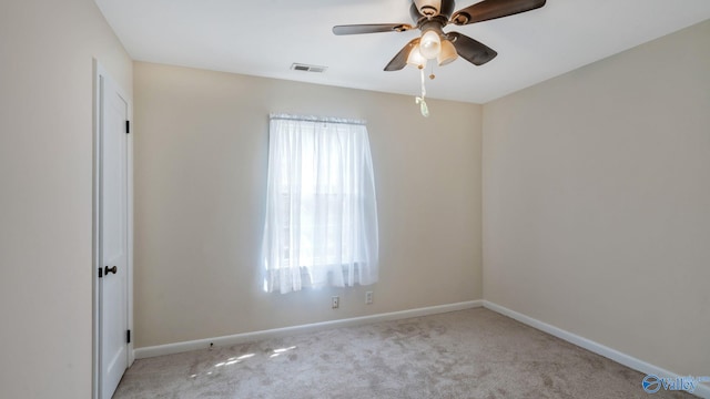701 10th St NW, Huntsville, AL 35805 - carpeted spare room featuring a ceiling fan, baseboards, and visible vents