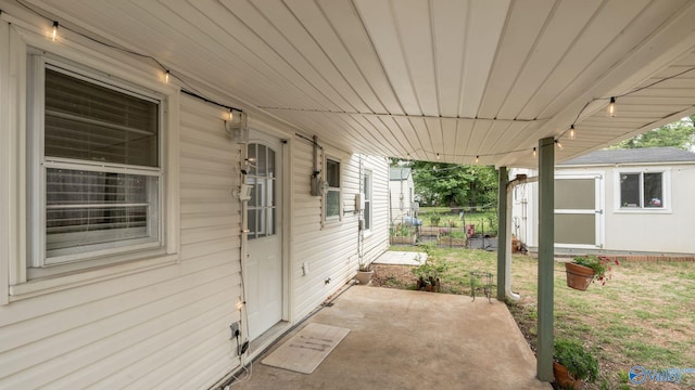 701 10th St NW, Huntsville, AL 35805 - view of patio featuring a storage shed and an outdoor structure