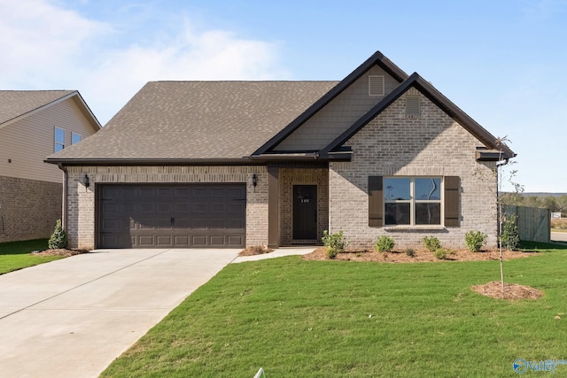 craftsman inspired home with a front yard and a garage