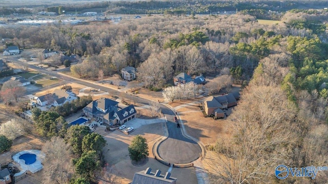 bird's eye view with a forest view