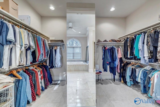 spacious closet with tile patterned floors and a ceiling fan