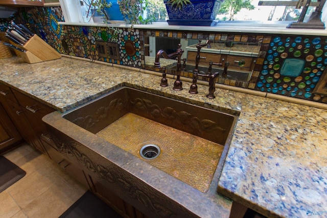 details featuring sink and tile patterned flooring