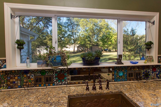 interior details with sink and backsplash