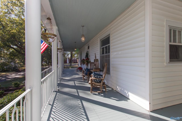 deck with covered porch