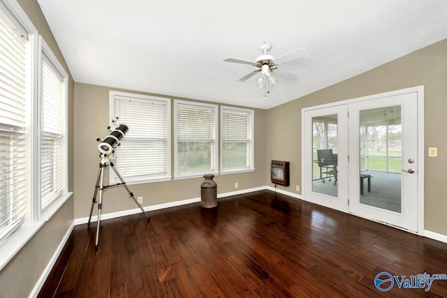 unfurnished sunroom with french doors and heating unit