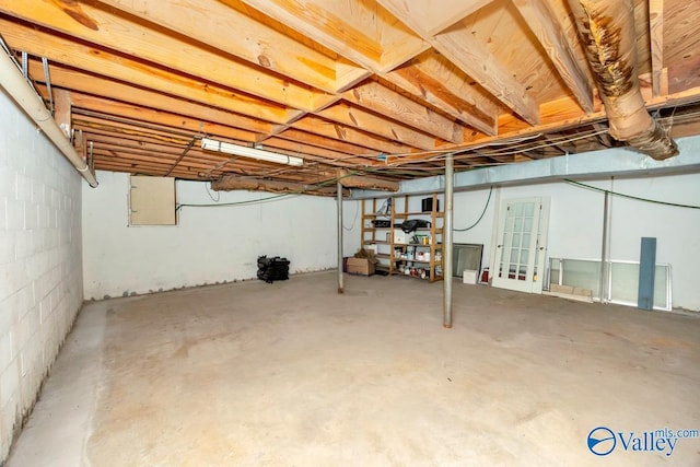 unfinished basement with electric panel