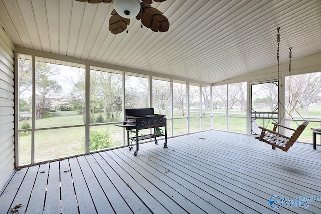 sunroom / solarium with ceiling fan