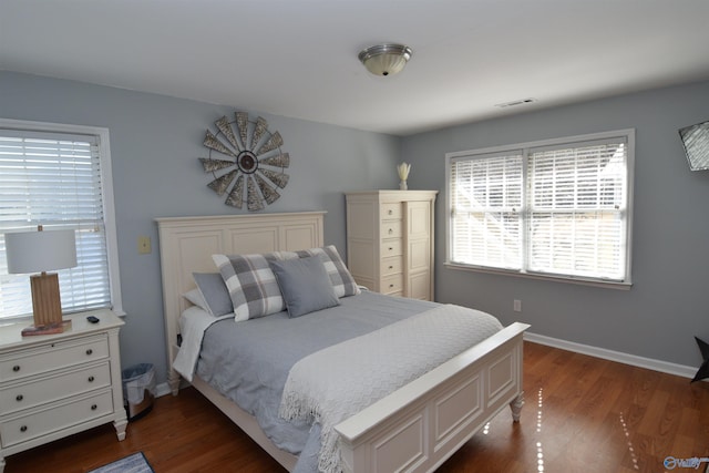 bedroom featuring dark hardwood / wood-style floors