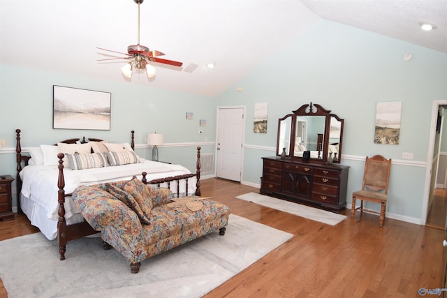 bedroom featuring vaulted ceiling, ceiling fan, and hardwood / wood-style floors