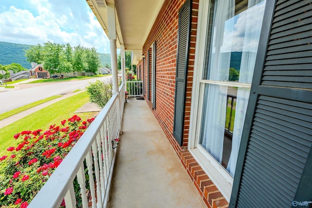 balcony featuring a porch