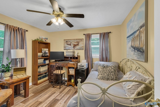 office area with ceiling fan and light hardwood / wood-style flooring