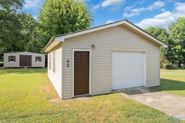 garage featuring a yard