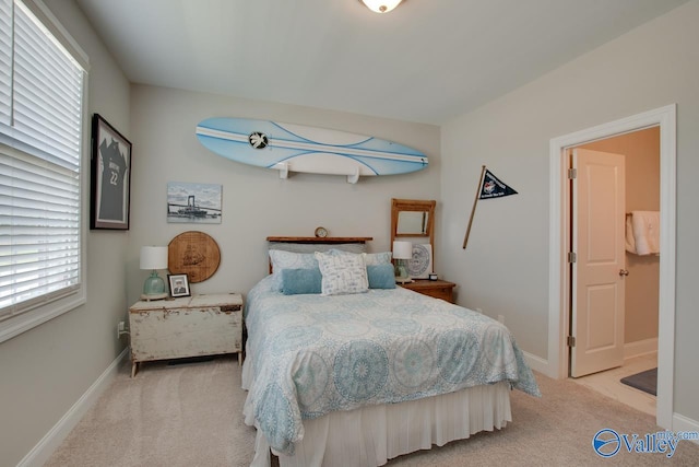 bedroom with light colored carpet