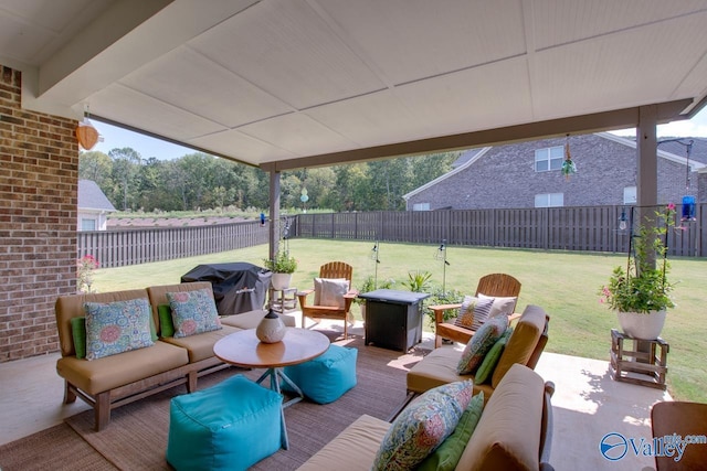 view of patio / terrace with grilling area and an outdoor hangout area